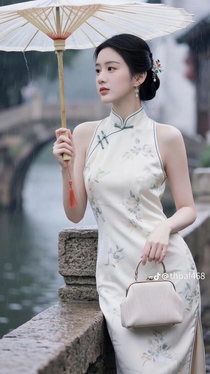 Gái mặc sườn xám gợi cảm kín đáo